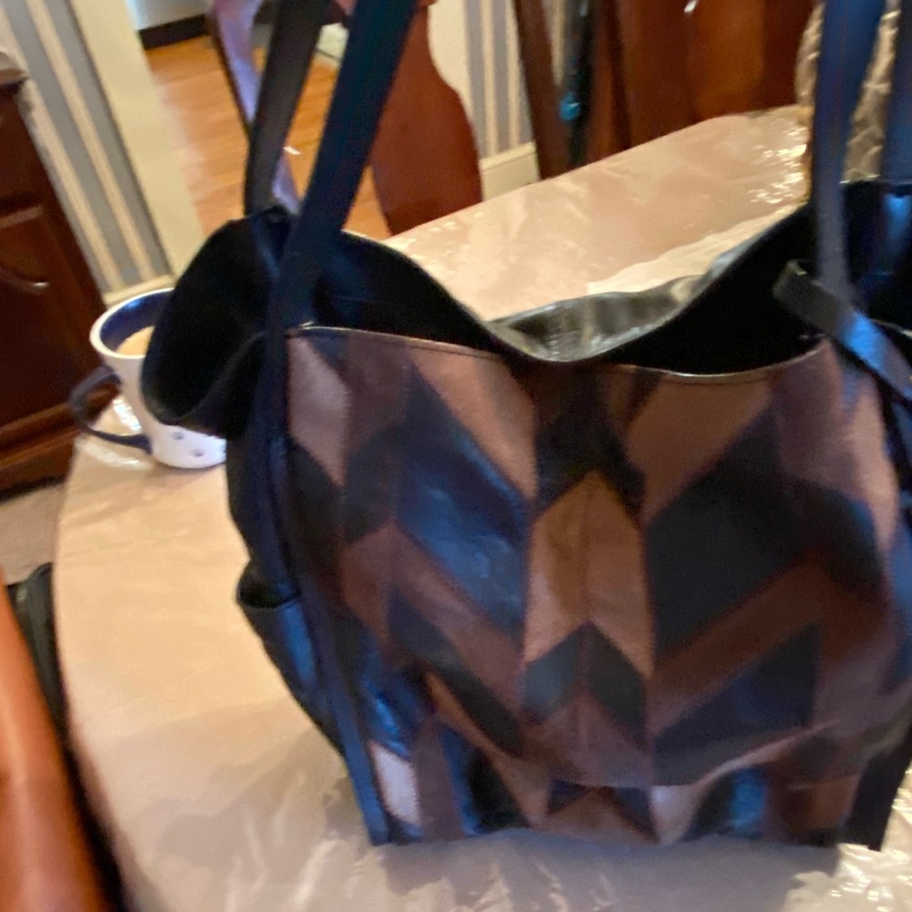 Lucky brand black hobo style bag  tan suede patches snap closure